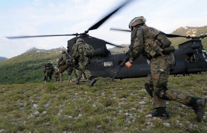 22 September 2009: Members of a special operations assault team from Poland dashes to the rear of an U.S. Army MH-47 Chinook helicopter, assigned to the 160th Special Operations Aviation Regiment, during fast rope insertion/extraction system training at Kovachevo, Croatia as part of the Jackal Stone 2009 exercise held in Croatia.