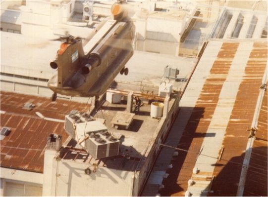 An Argentine Chinook, tail number unknown, transporting an air conditioning system in La Plata, Buenos Aires, Argentina, on 1 May 1981.