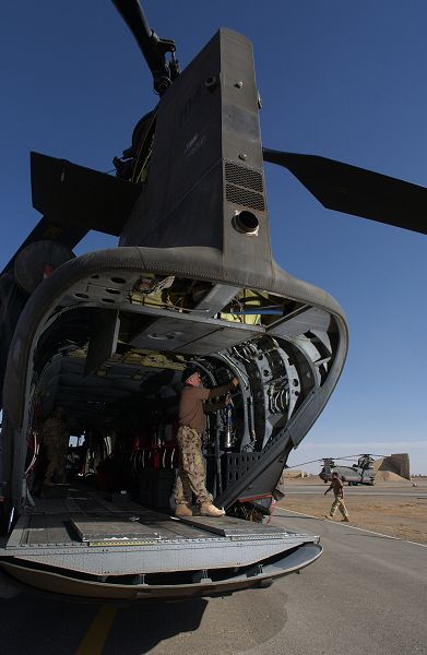 A crewman checks the maintenance panel of A15-104 during ground check out.