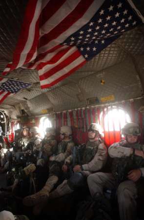 U.S. soldiers of the 82nd Airborne ride in a Chinook helicopter on 2 June 2003 at the start of Operation Dragon Fury at Bagram, Afghanistan. The operation took place in the Showi Kowt mountains in eastern Afghanistan, in the same vicinity as Operation Anaconda, and was the largest since that March 2002 mission.