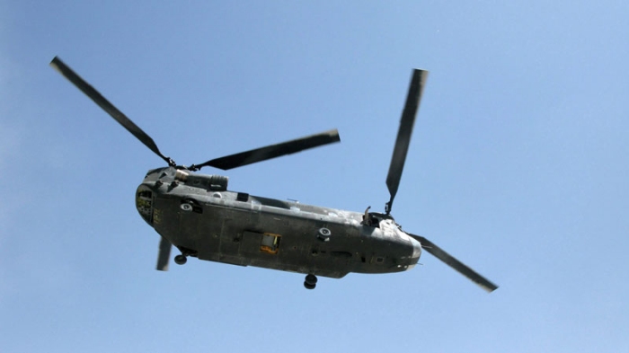 A Canadian Chinook helicopter is pictured on 10 September 2009 in Afghanistan. Canadian National Defence has put 'For Sale' signs on the air force's Chinook helicopters in Afghanistan - two years after taxpayers shelled out $282 million to buy them.