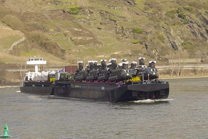 2004: The CH-47D Chinook helicopter fleet belonging to Big Windy - home based in Germany - returns from Iraq after participating in Operation Iraqi Freedom (OIF). The aircraft were transported by the Netherland's flagged Inland Cargo Vessel "VERA" and "RORO1" (non powered barge) up the Rhine River to the Theater Aviation Intermediate Maintenance (AVIM) facility located at Mannheim Germany.