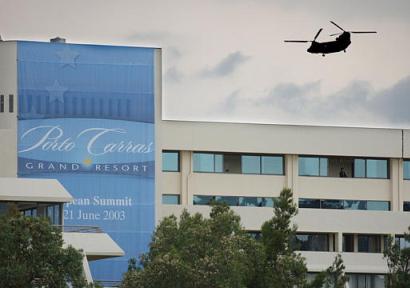 A Greek military Chinook helicopter flies over the Porto Carras Resort in Porto Carras, Greece.