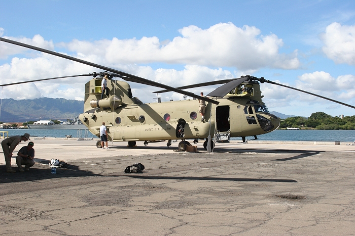 20 November 2010: CH-47F Chinook helicopter 09-08067 gets some final maintenance during reassembly on the dock at Pearl Harbor.