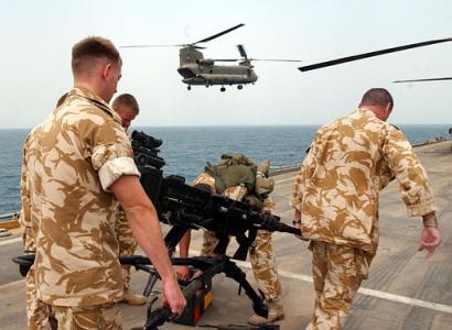 A Chinook prepares to land on HMS Ark Royal.