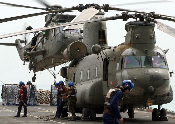 RAF Chinook HC Mark II helicopters continue to ferry supplies ashore from HMS Ark Royal to the Al Faw penninsula during March 2003.