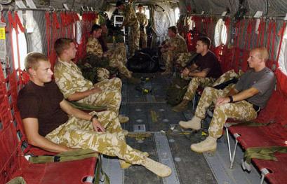 Friday, 25 June 2004: The eight British servicemen held since Monday by Iran for illegal entry into Iranian waters are transported by a Chinook helicopter to Kuwait enroute back to their units. Their earlier release by the Iranian authorities brought an end to a diplomatic stand-off between London and Tehran. The troops were detained Monday after their boats allegedly strayed into the Iranian side of the Shatt al-Arab waterway that runs along the Iran-Iraq border while delivering a patrol boat to Iraq's new river police.