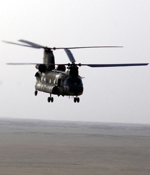 A CH-47D Chinook helicopter flies through Iraqi airspace enroute to one of the 101st Airborne Division's forward command posts. The helicopter-heavy division continued conducting deep air assaults far into Iraq today.