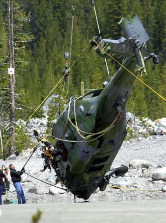 An Army National Guard CH-47D Chinook recovers a crashed Air Force Pave Hawk on Mount Hood, Oregon.
