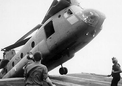 A CH-47A Chinook (tail number unknown), belonging to the Republic of Vietnam (ARVN), gets dumped overboard during the final days of the Vietnam War, circa 1975.