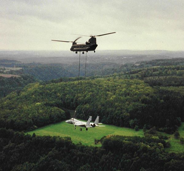 87-00112, owned and operated by "Big Windy" moves a diabled U.S. Air Force F-15 Eagle from Spangdahlem AFB to Bitburg AFB on 9 September 1993.