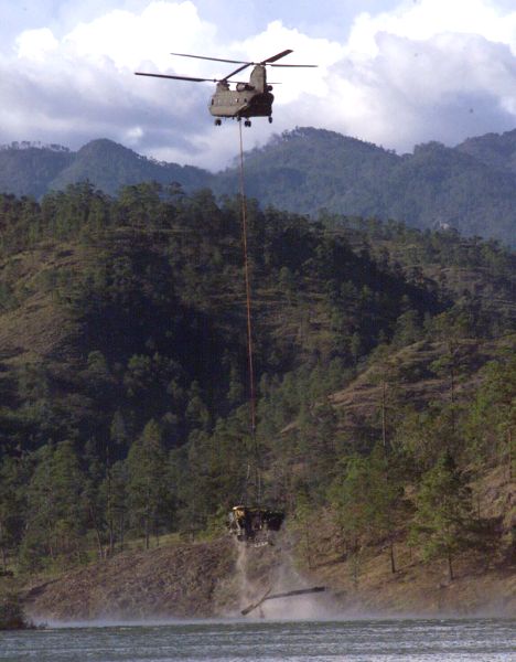A CH-47D recovery of a downed Honduran UH-1 helicopter.