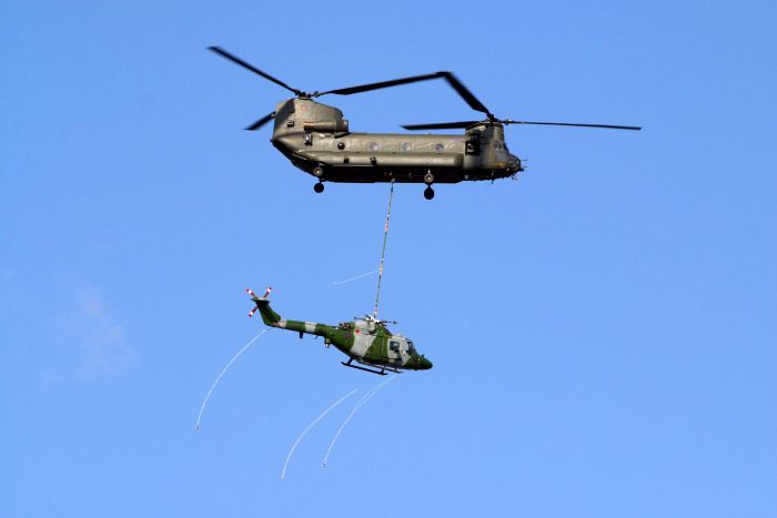 An RAF Linx is transported via an HC-2 Chinook helicopter.