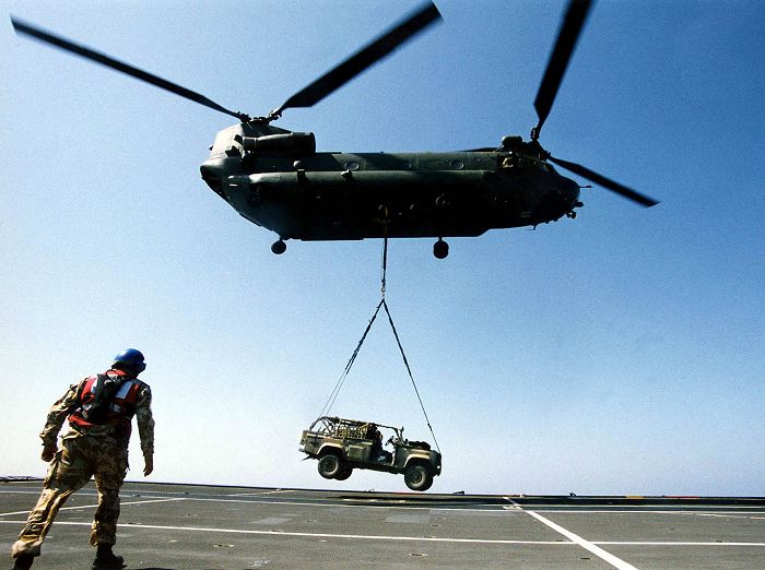 Royal Marines from 40 Commando training with Chinooks from 18 Squadron during loading drills aboard HMS Ocean.
