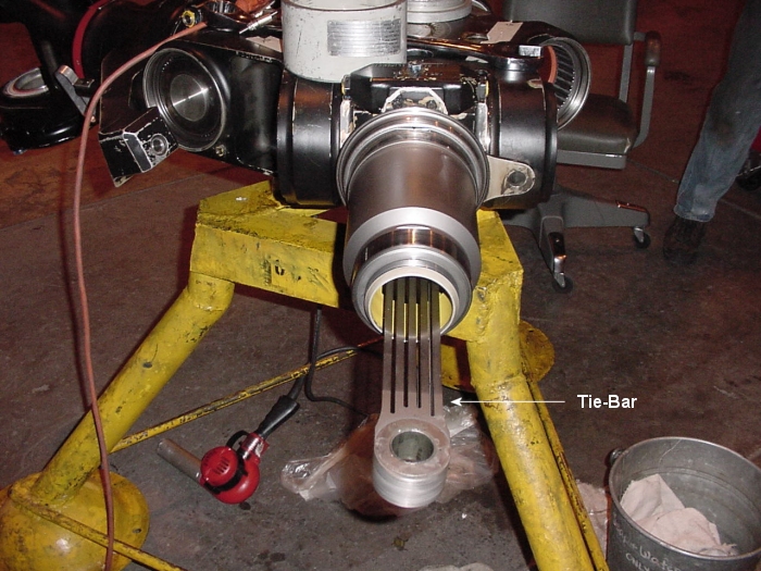 The Tie-Bar on the CH-47D Chinook helicopter that holds the main rotor blade onto the rotor head.